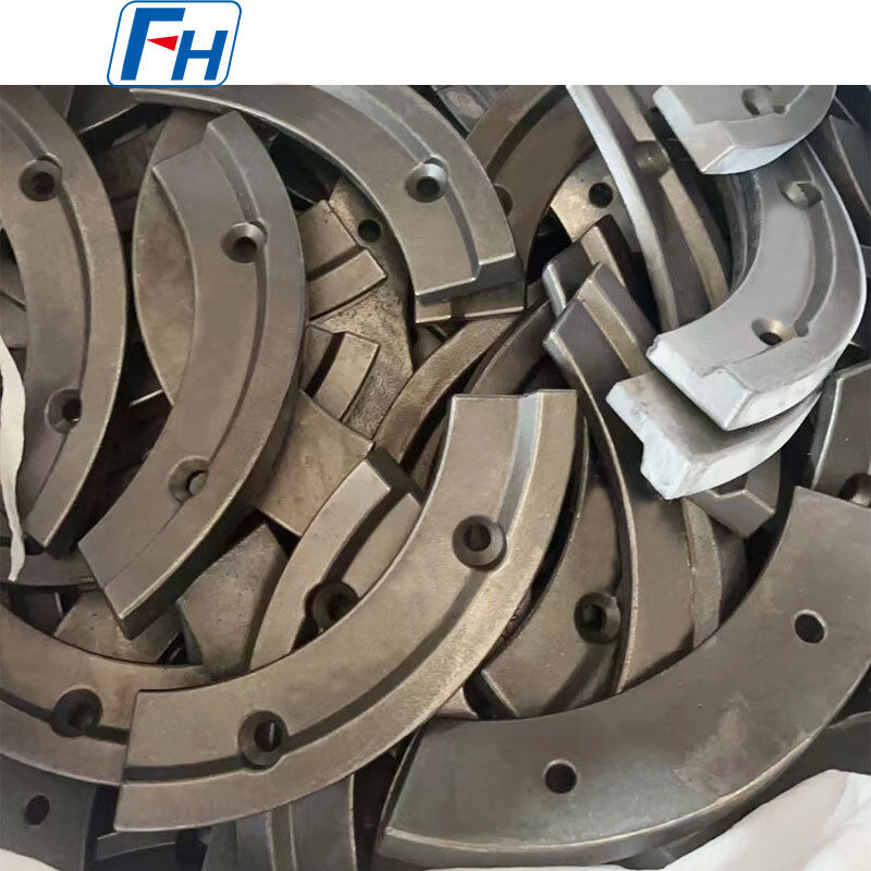 ใบสึกของเครื่องผสมคอนกรีต (แบบโค้ง) | ใบมีดโลหะผสม Ni-Hard FH®